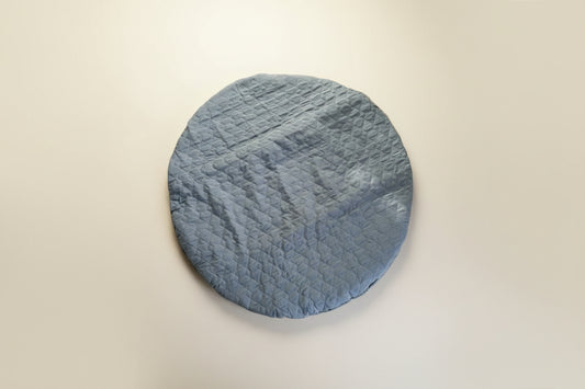 Round blue quilted baby play mat