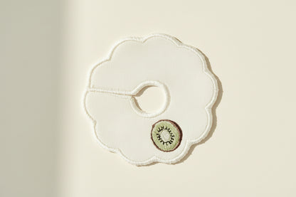 White scallop patch with embroidered kiwi design