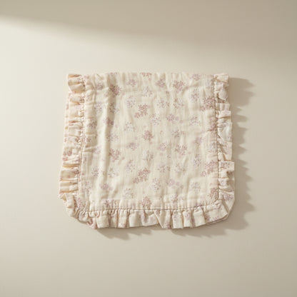 Floral-patterned burp cloth with ruffled edges