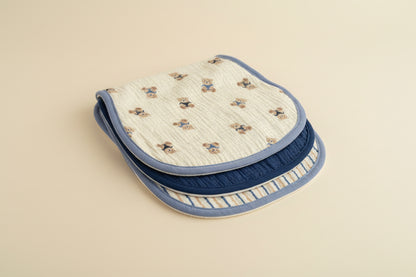 Three burp cloths with different patterns
