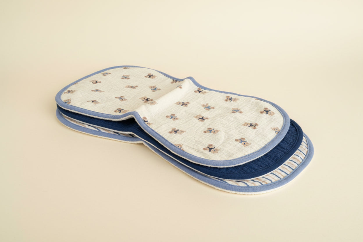 Three burp cloths with different patterns 