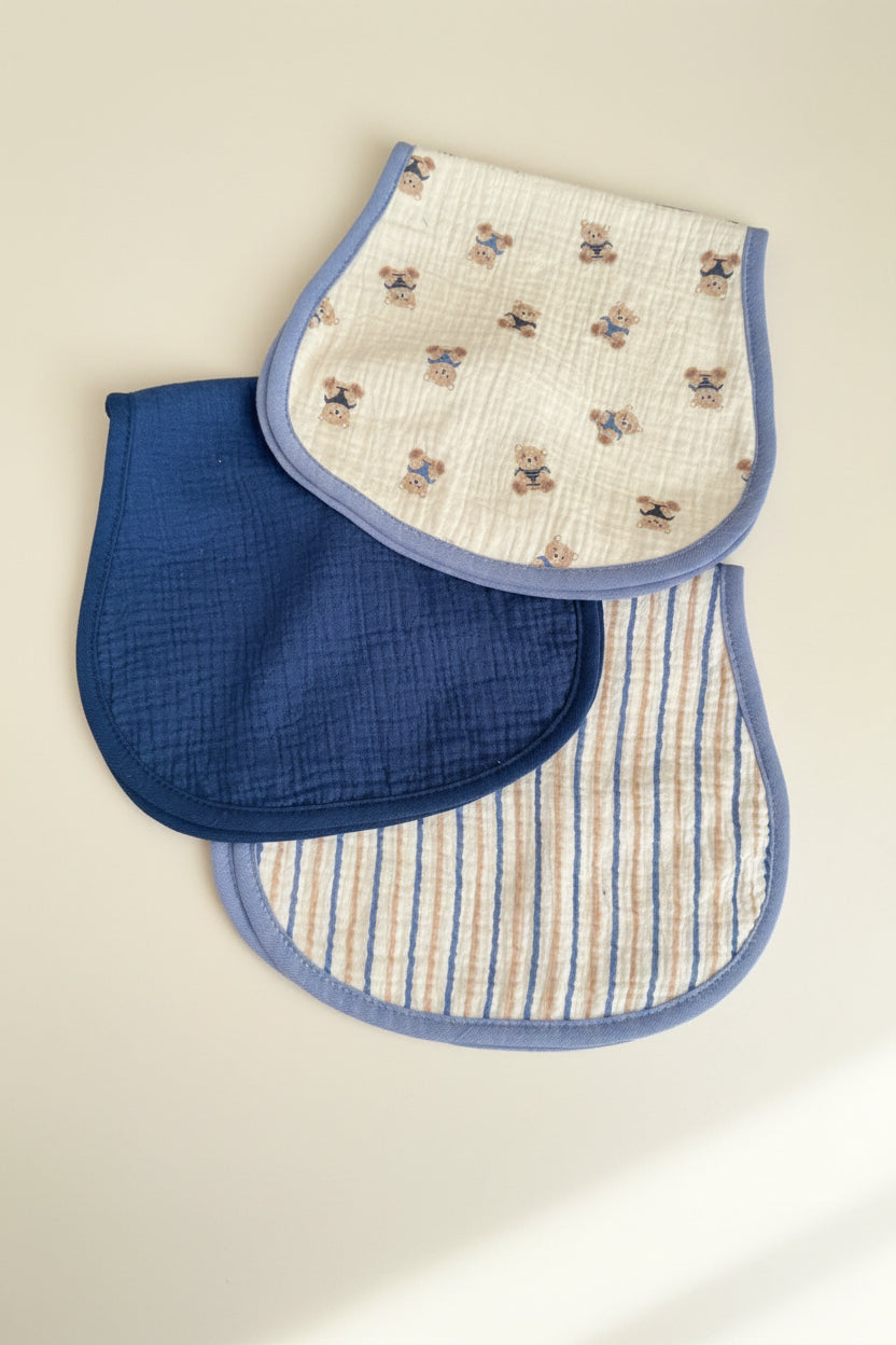 Three burp cloths with different patterns 