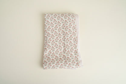 2 baby blanket set with floral and striped design.