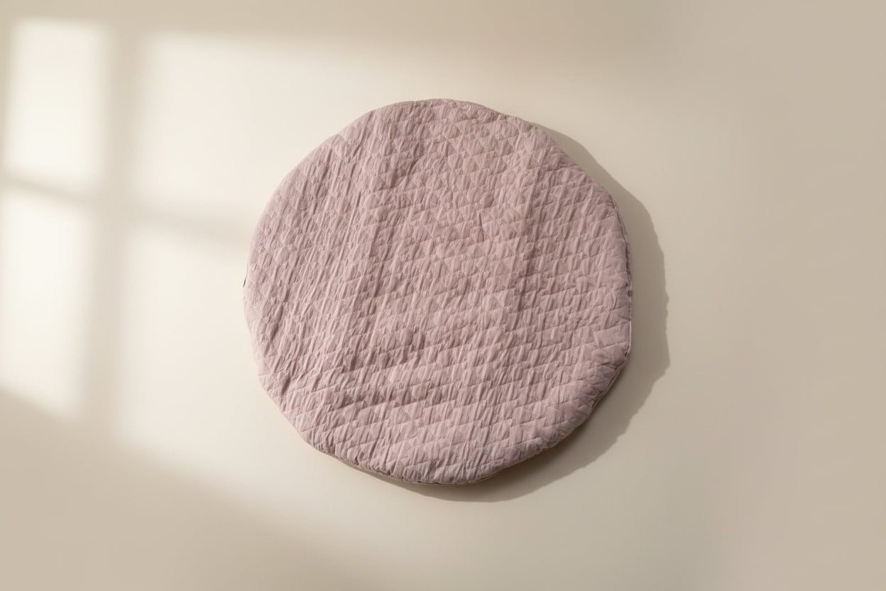 Round pink quilted baby play mat