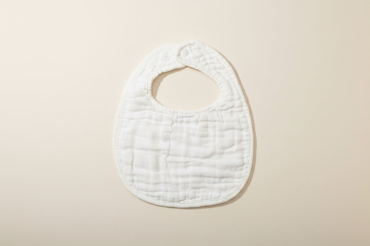 White bib on a beige surface
