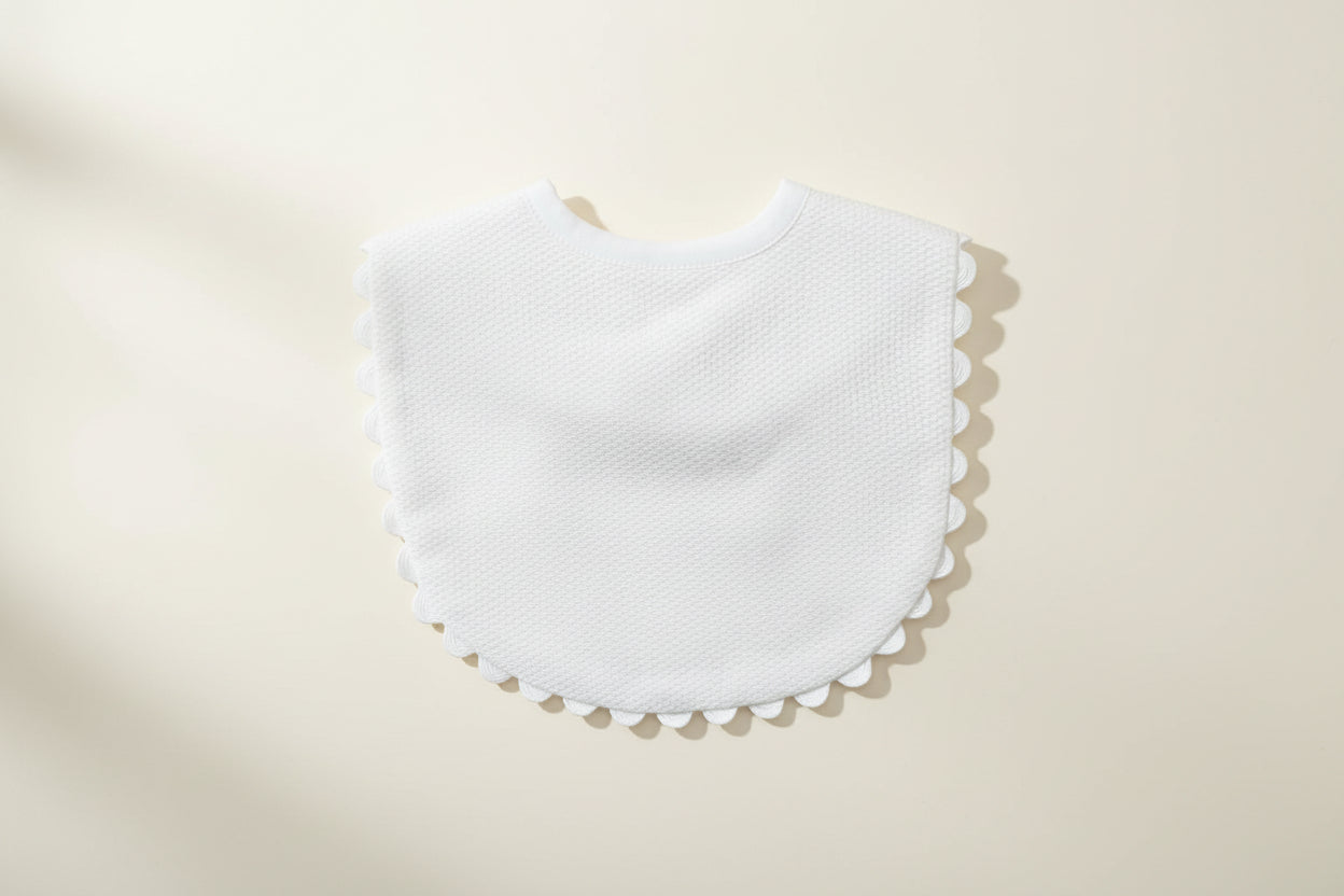 White bib on a wooden surface