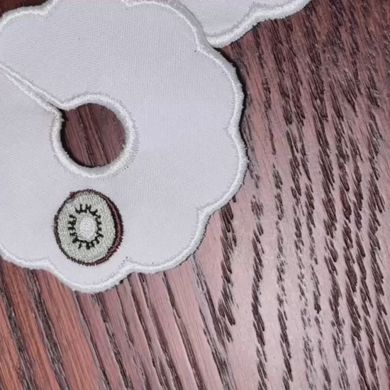 video of wine stem tags on wooden surface