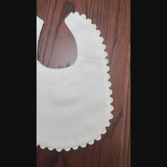 white ric rac trim bib