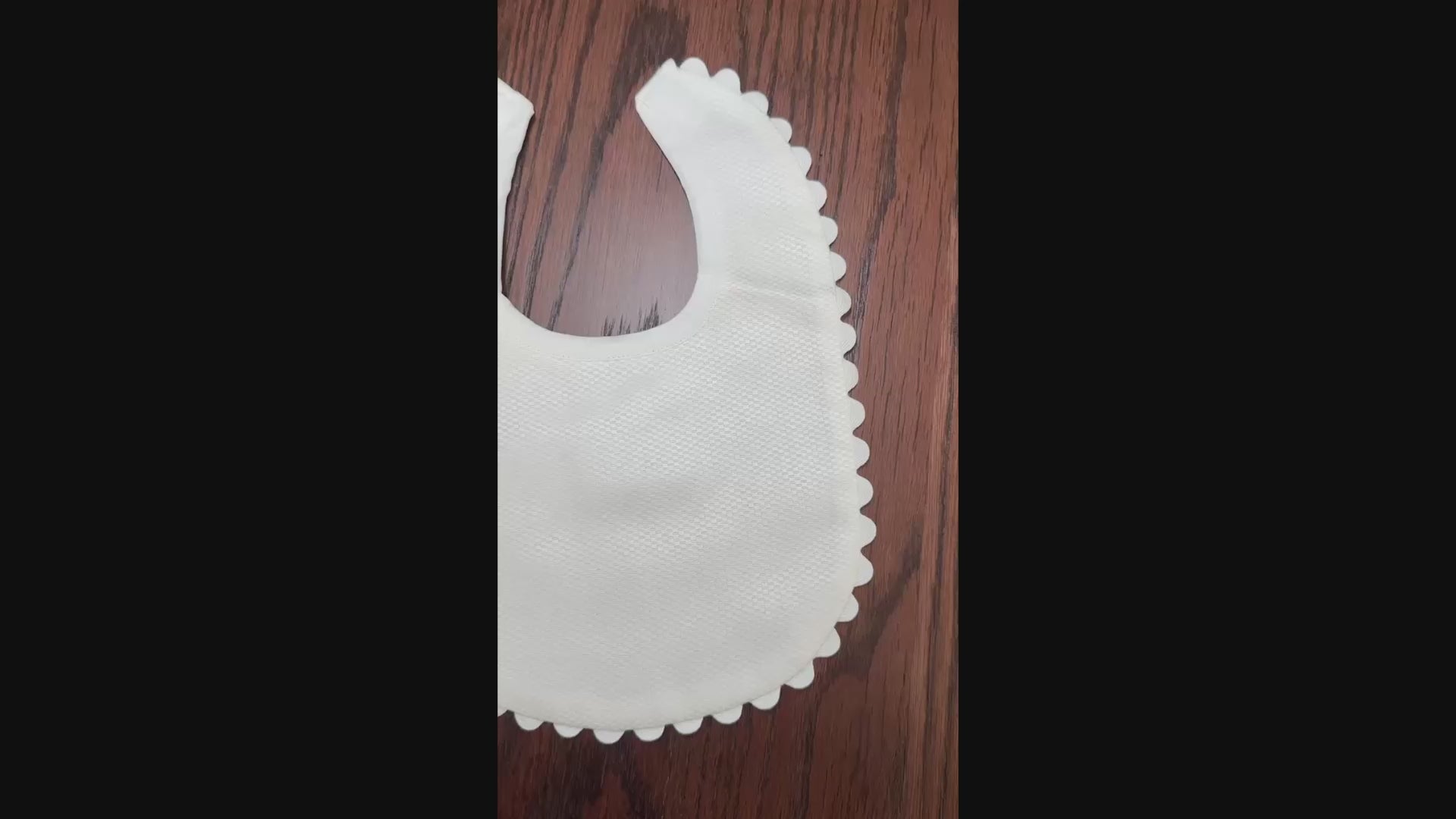 white ric rac trim bib